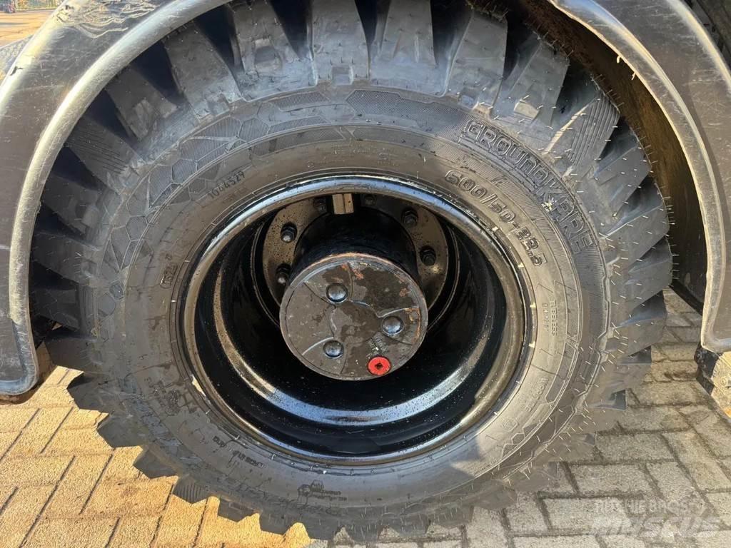 CAT M315F Gumikerekes kotrók