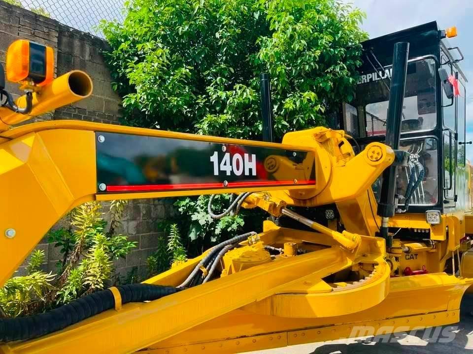 CAT 140h Gréderek