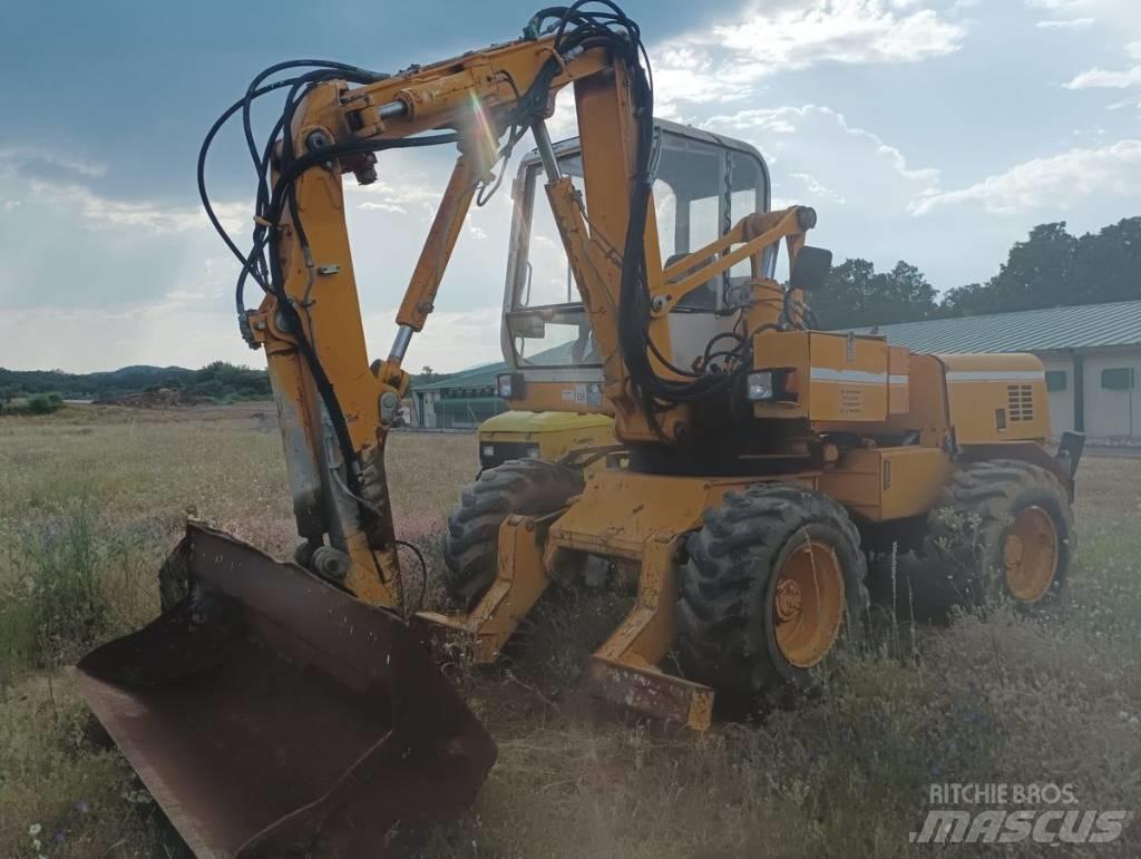 Mecalac 11 CX Gumikerekes kotrók