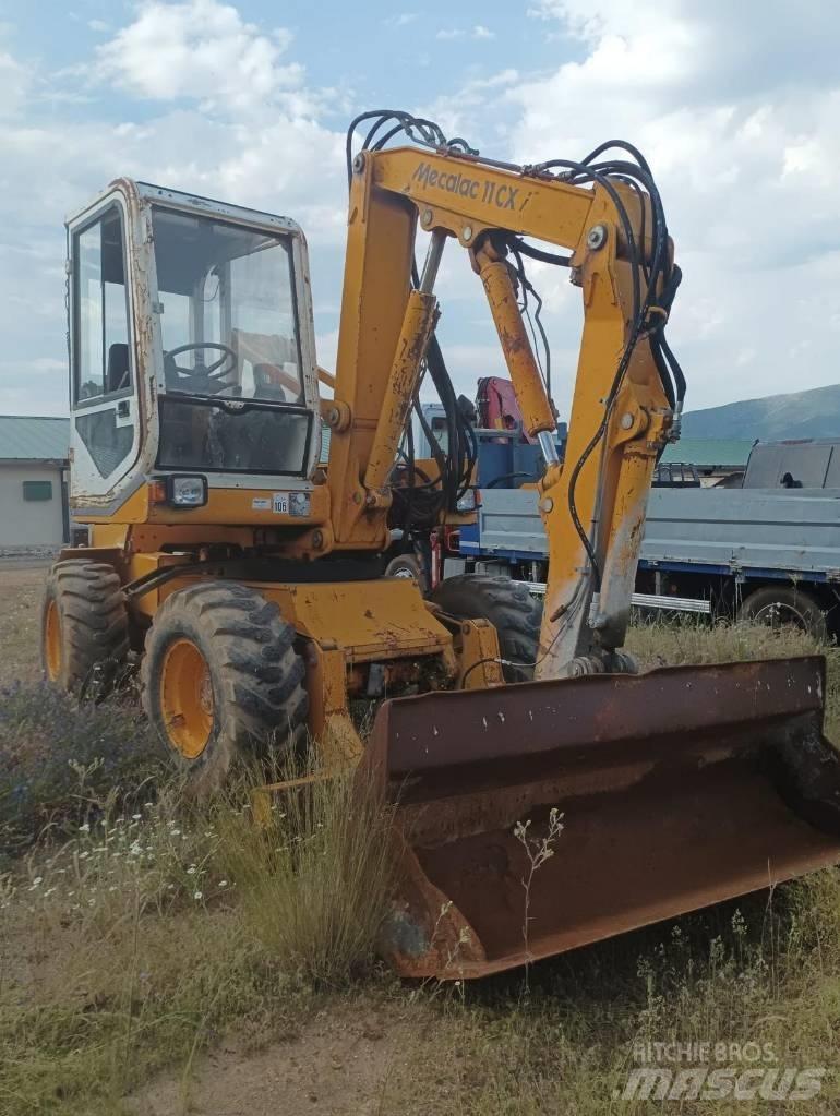 Mecalac 11 CX Gumikerekes kotrók