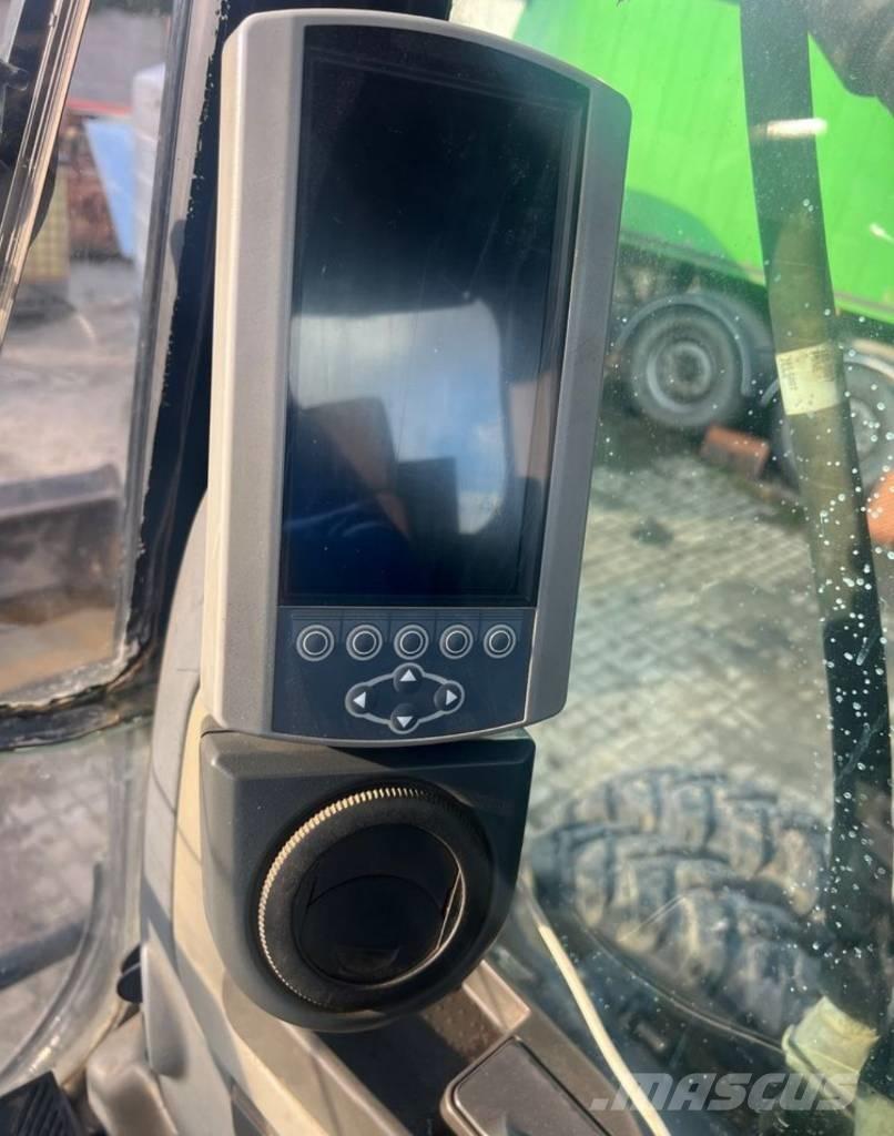 CAT M313D Gumikerekes kotrók