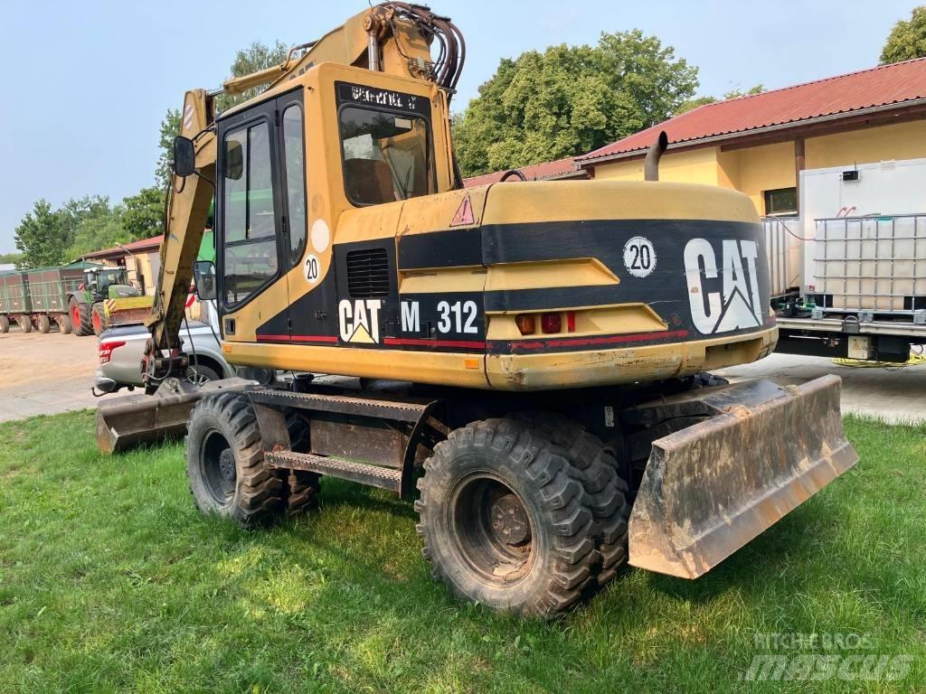 CAT M 312 Gumikerekes kotrók