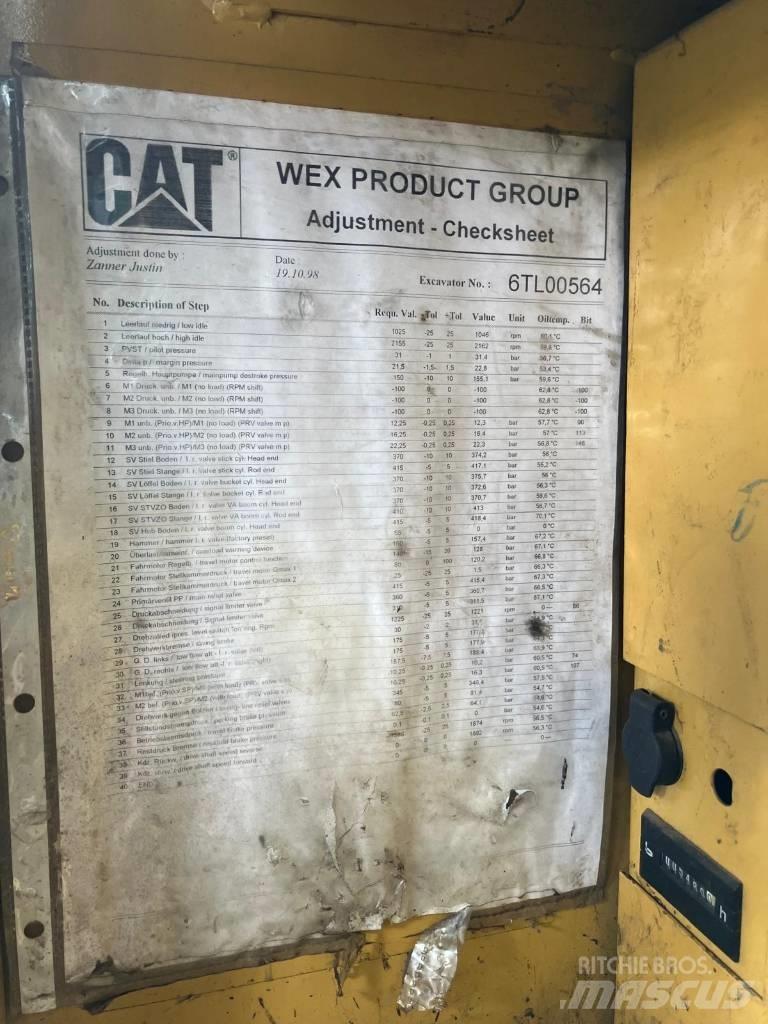 CAT M 312 Gumikerekes kotrók