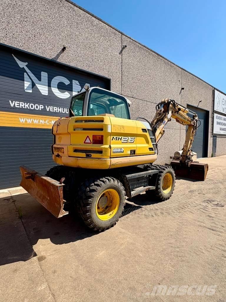 New Holland MH 2.6 Gumikerekes kotrók