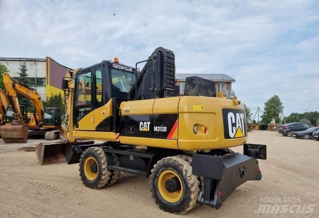 CAT M313 D Gumikerekes kotrók