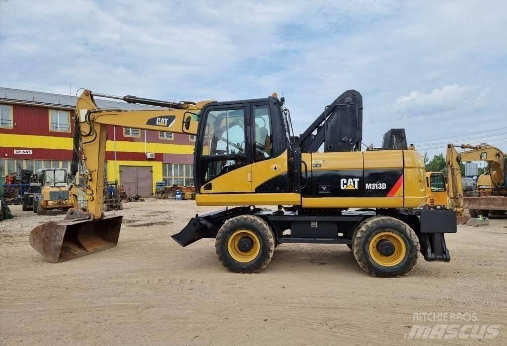 CAT M313 D Gumikerekes kotrók