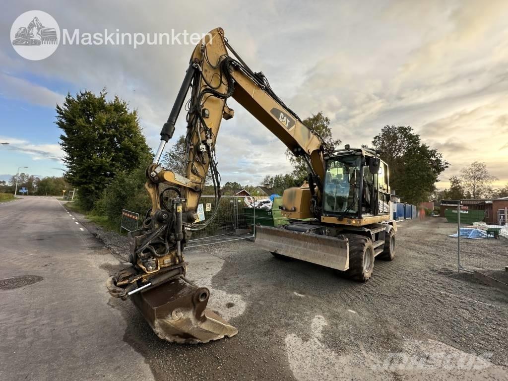 CAT M 317 Gumikerekes kotrók