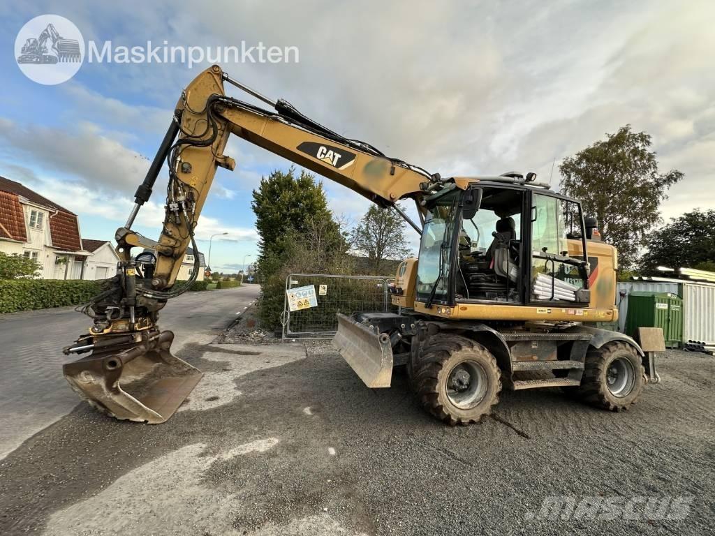 CAT M 317 Gumikerekes kotrók