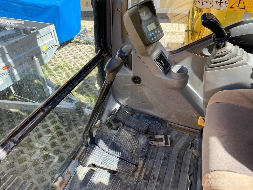 New Holland E 215 Lánctalpas kotrók