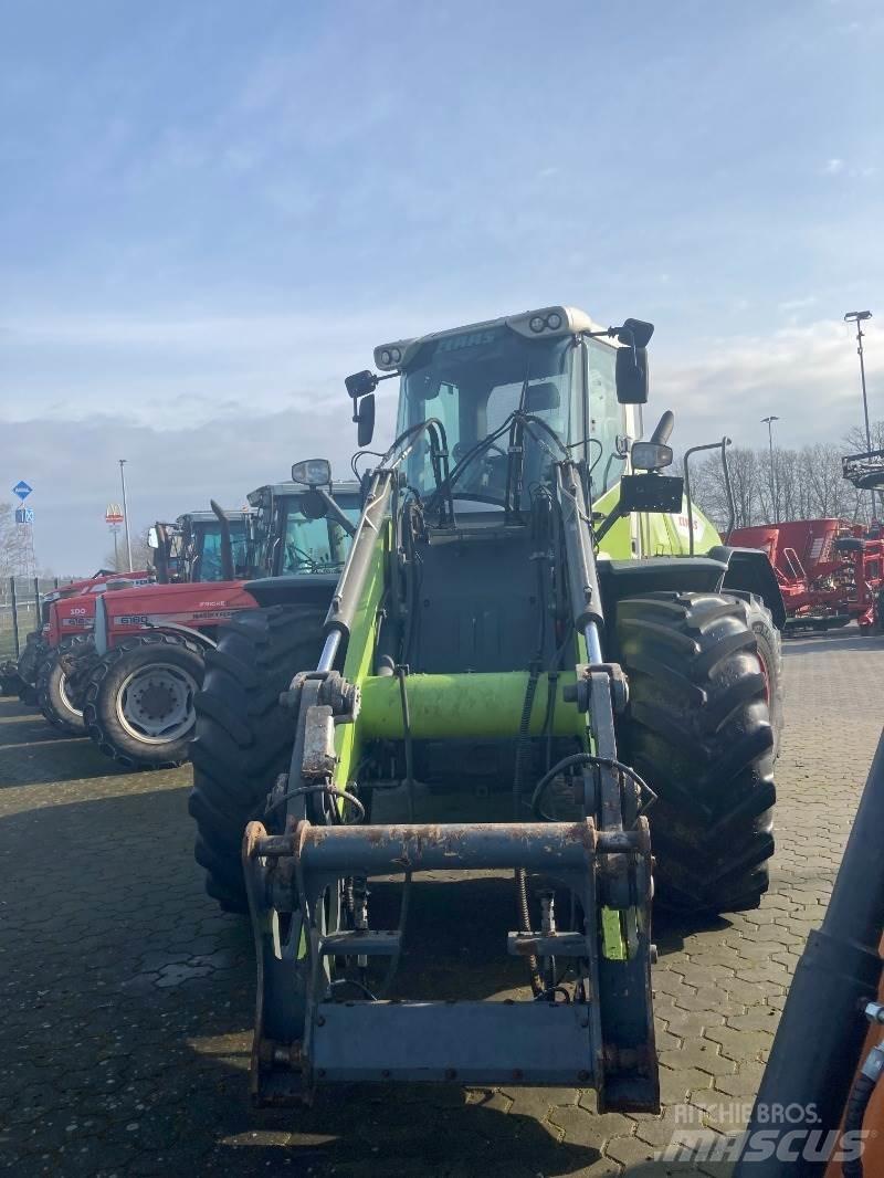 CLAAS Torion 1410 Gumikerekes homlokrakodók