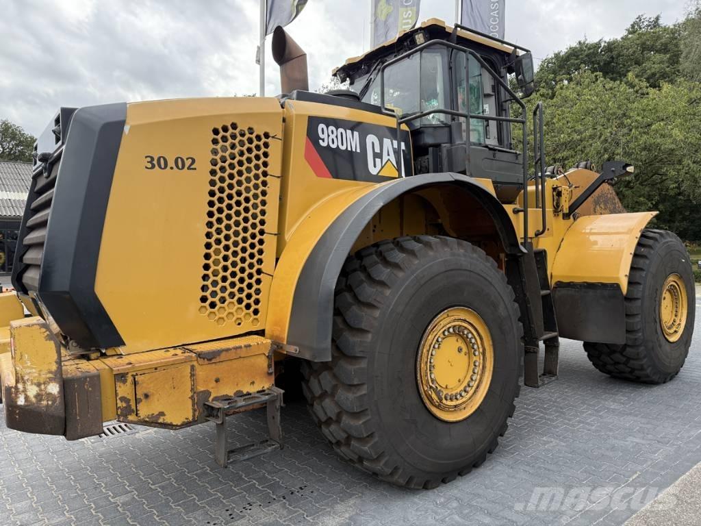CAT 980M shovel + Bak Gumikerekes homlokrakodók