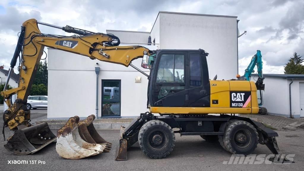 CAT M 313 D Gumikerekes kotrók