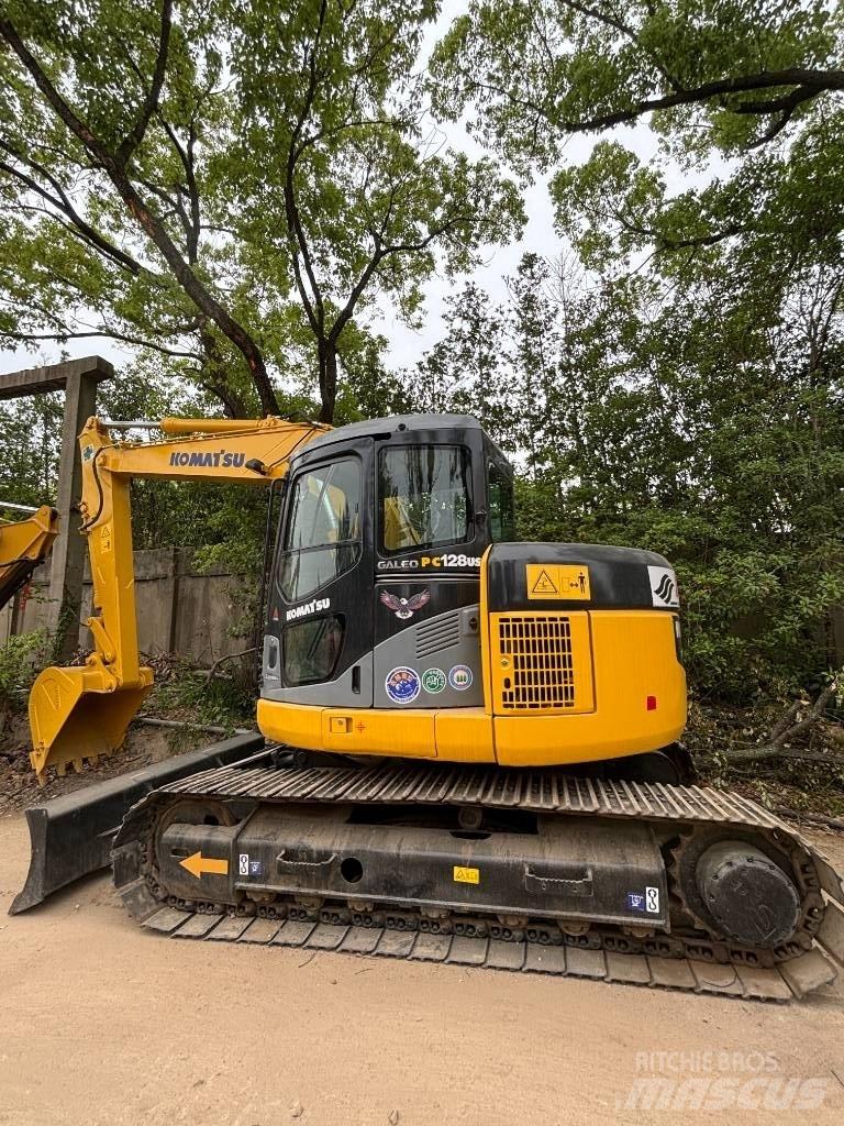 CAT pc 128us Közepes (midi) kotrók 7 t - 12 t