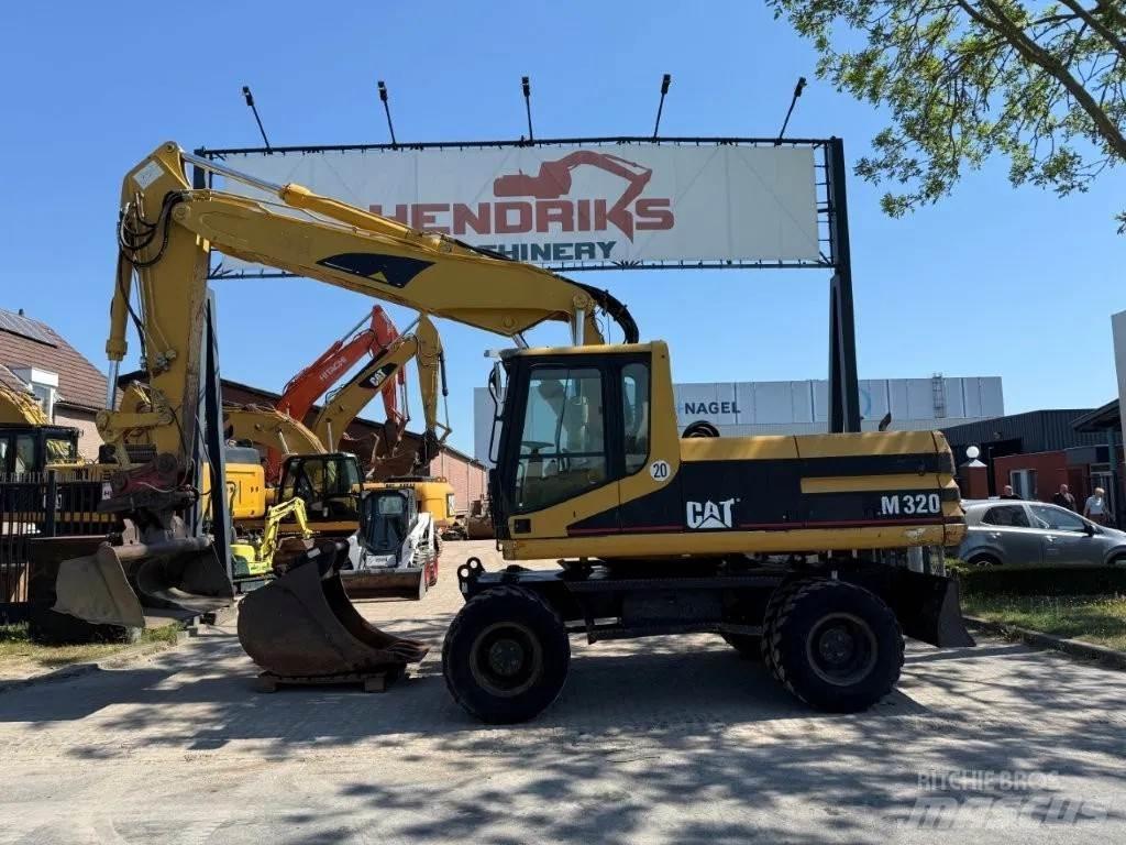 CAT M320 2001 Gumikerekes kotrók