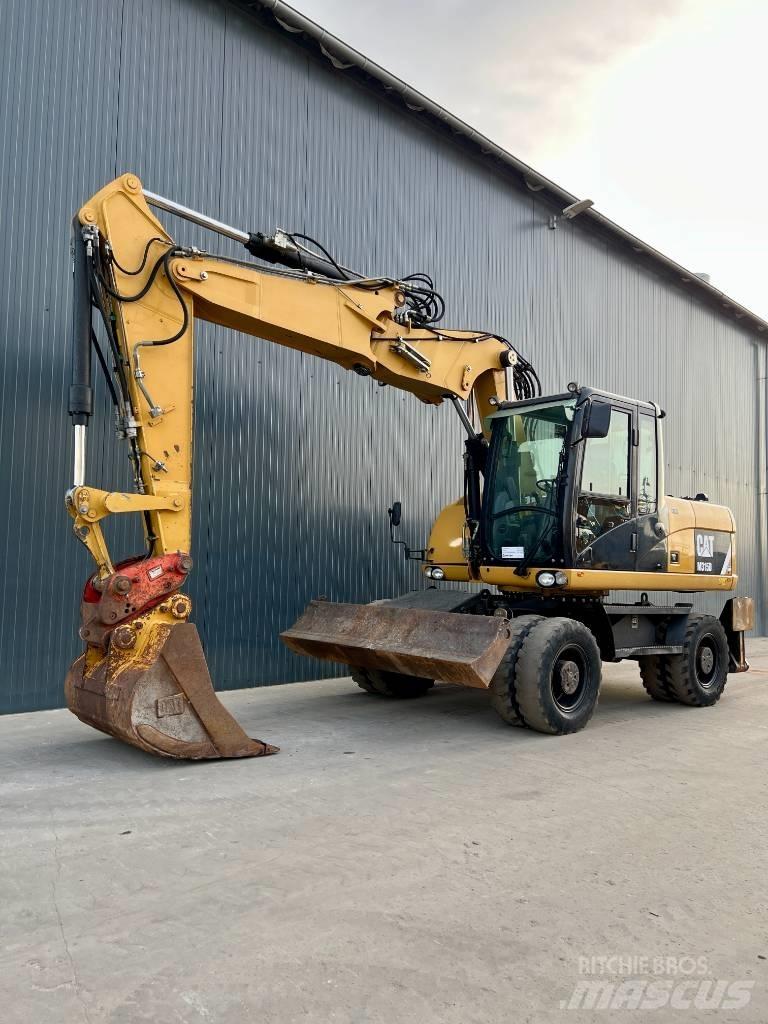 CAT M315D Gumikerekes kotrók