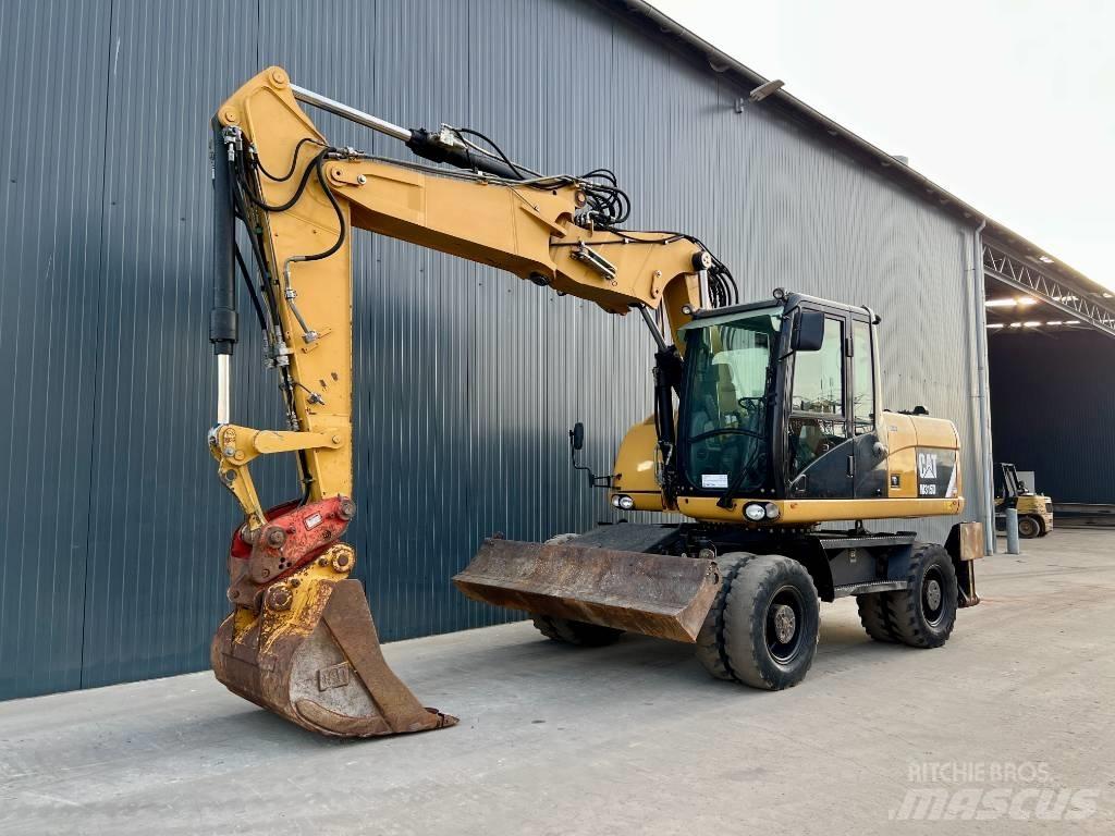 CAT M315D Gumikerekes kotrók