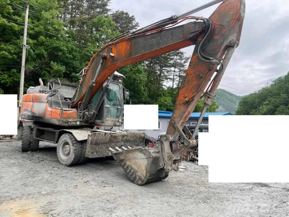 Doosan DX 210 W Gumikerekes kotrók