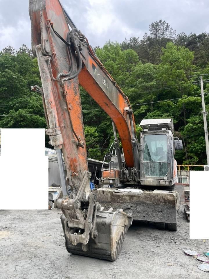 Doosan DX 210 W Gumikerekes kotrók