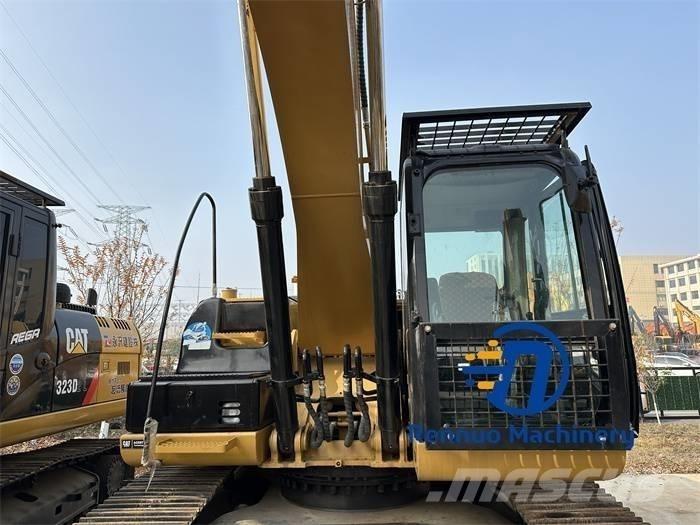 CAT 323D/323/323DL Lánctalpas kotrók
