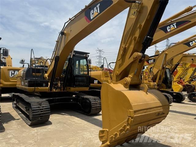 CAT 323 D L Lánctalpas kotrók