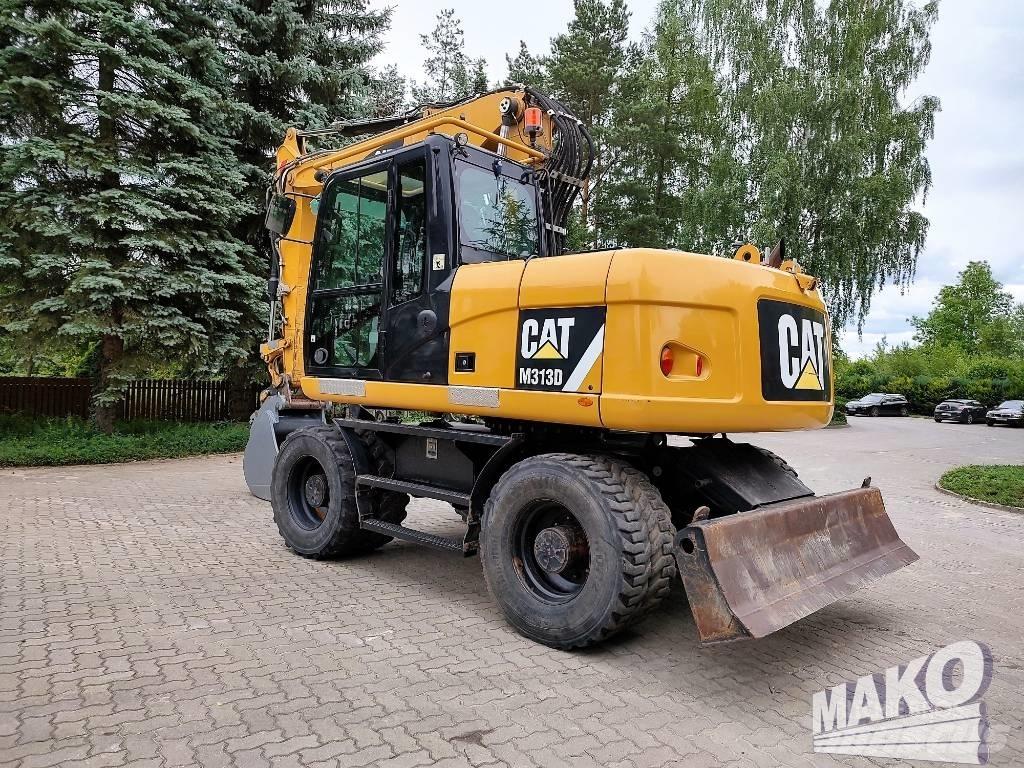 CAT M 313 D Gumikerekes kotrók