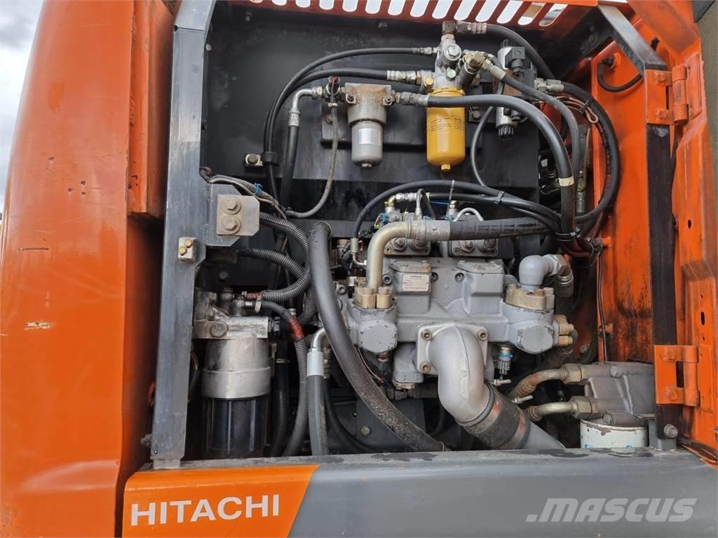 Hitachi ZX 140 W-3 Gumikerekes kotrók