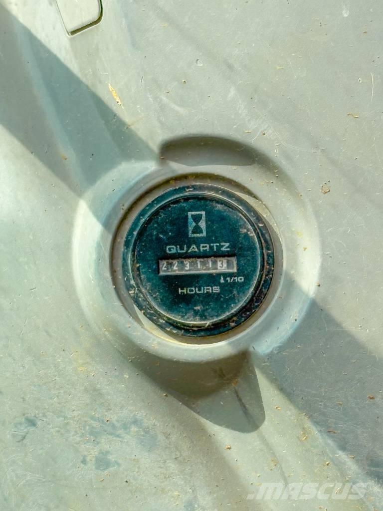 New Holland E 245 B Lánctalpas kotrók