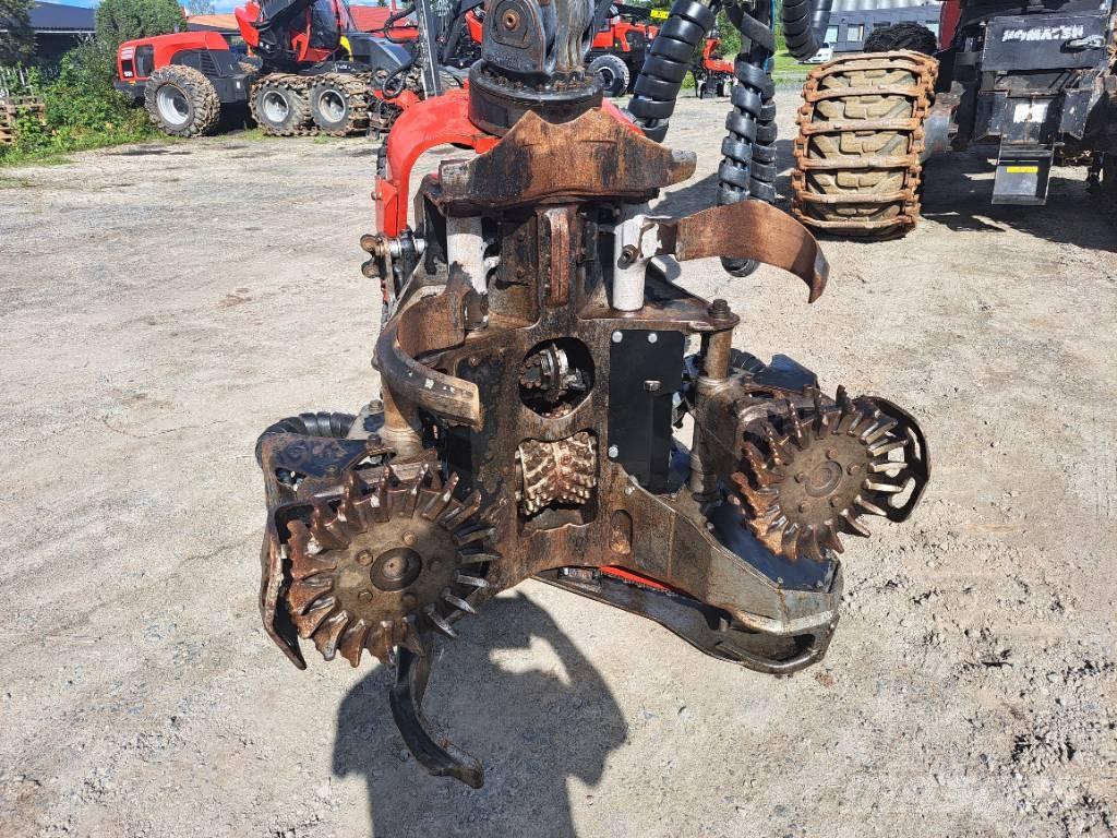 Komatsu 931 Betakarítók