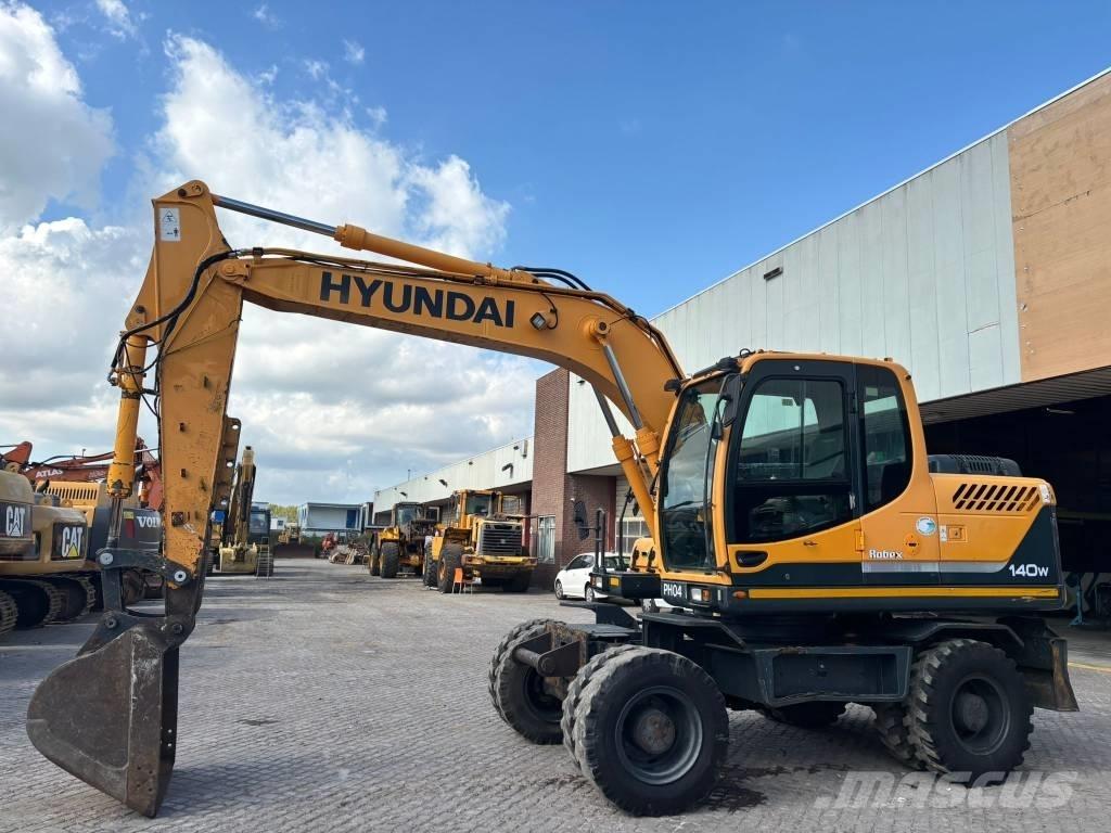 Hyundai 140W-9 Gumikerekes kotrók