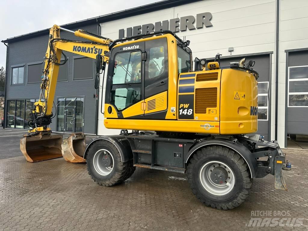 Komatsu PW 148-11 Gumikerekes kotrók