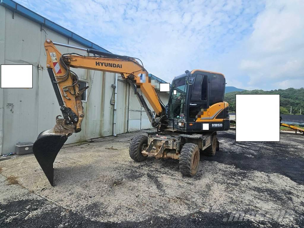 Hyundai HW60 Gumikerekes kotrók