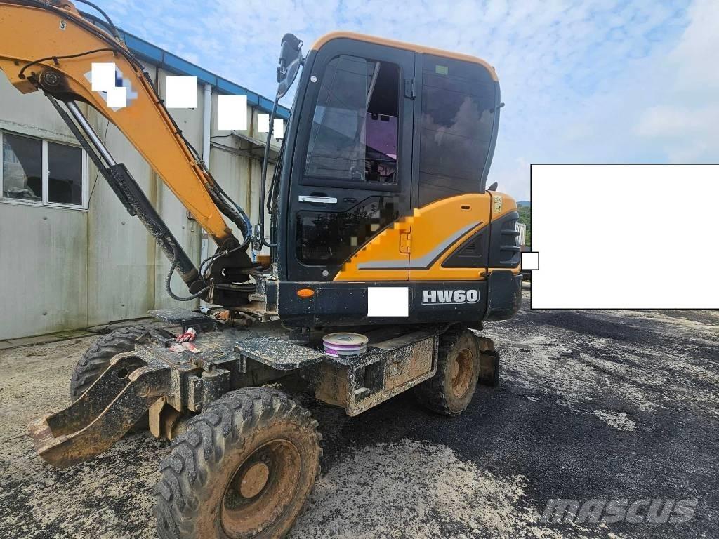 Hyundai HW60 Gumikerekes kotrók