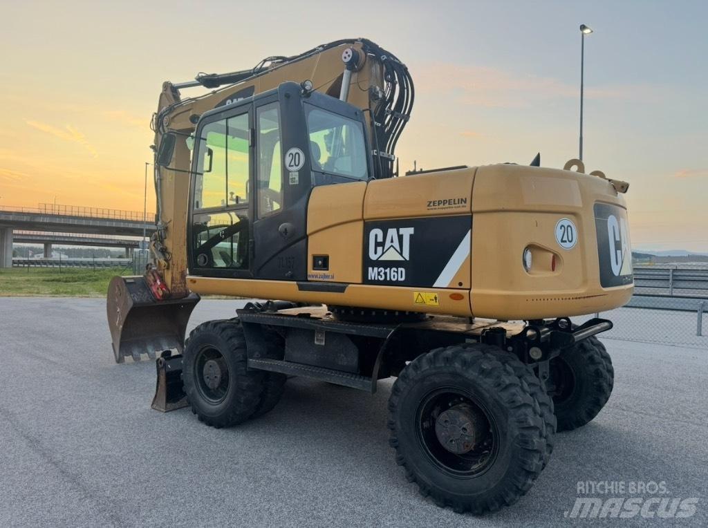 CAT M 316 D Gumikerekes kotrók