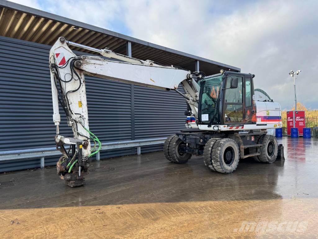 CAT M315D Gumikerekes kotrók