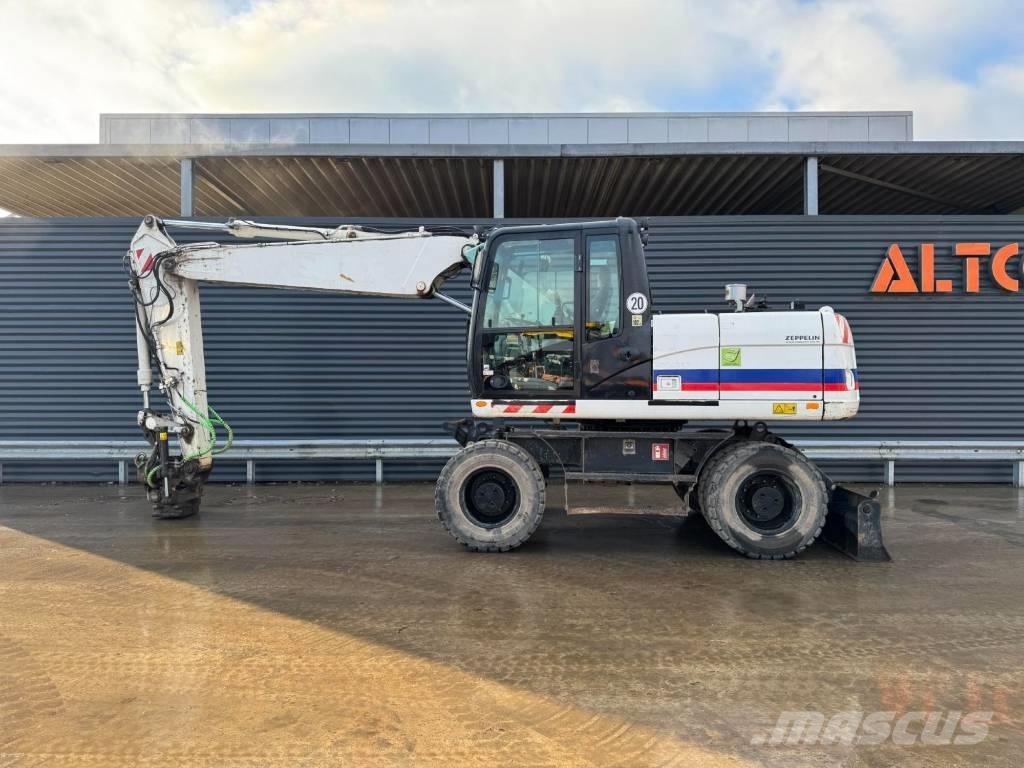 CAT M315D Gumikerekes kotrók