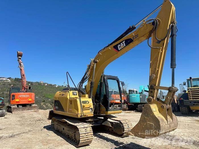 CAT 311C Speciális kotrók