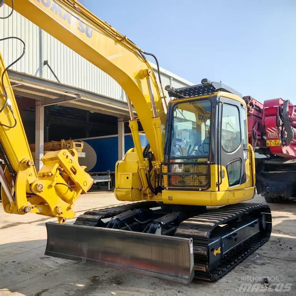 Komatsu PC 128 US Közepes (midi) kotrók 7 t - 12 t