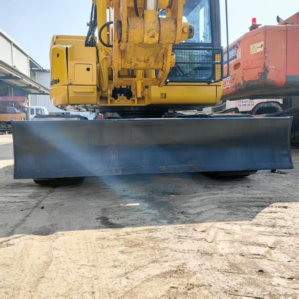 Komatsu PC 128 US Közepes (midi) kotrók 7 t - 12 t