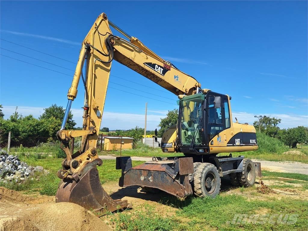CAT M 318 C 4X4 Építőipar - Egyebek