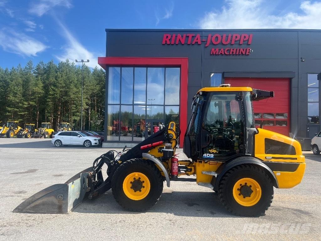 JCB 409 / Myyty, Sold Gumikerekes homlokrakodók
