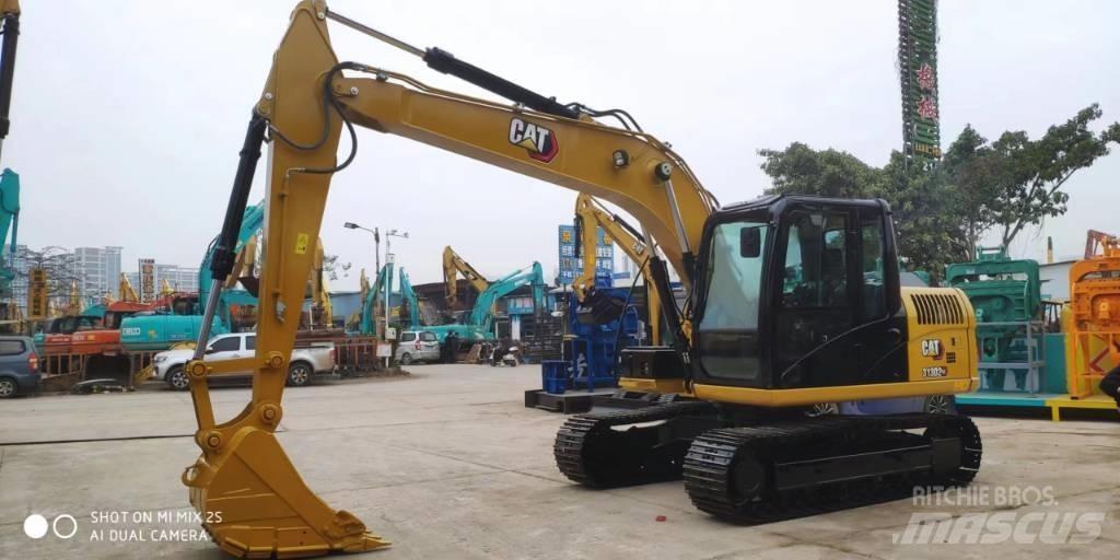 CAT 2021 CAT 313D2GC Gumikerekes kotrók