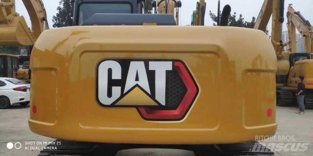 CAT 2021 CAT 313D2GC Gumikerekes kotrók