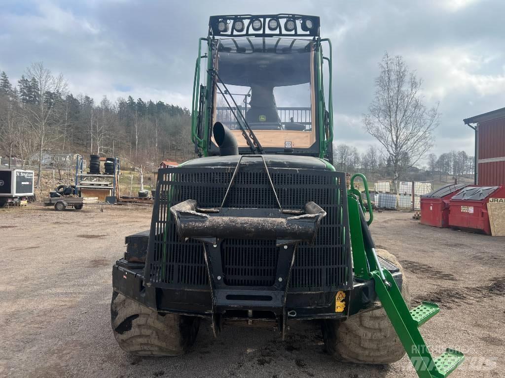 John Deere 810 E Kihordók