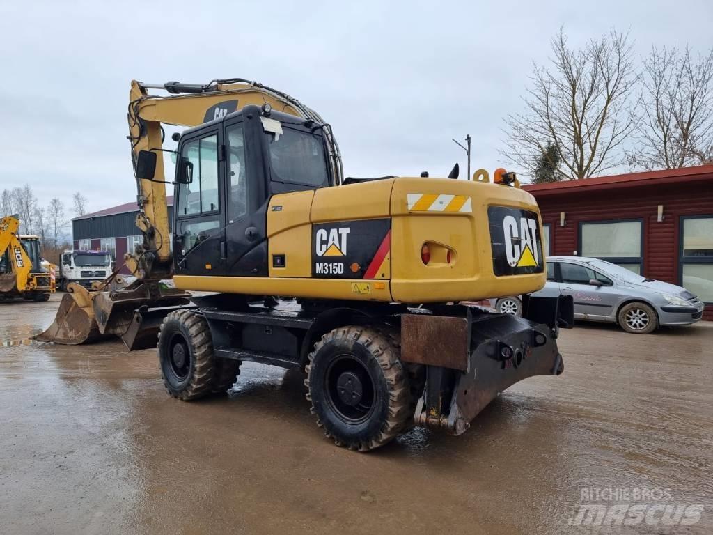 CAT M 315 D II Gumikerekes kotrók