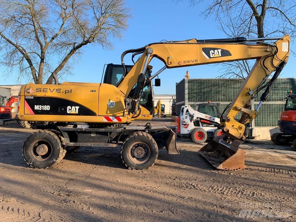 CAT M 318 D Gumikerekes kotrók