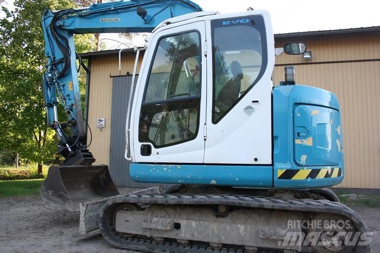  New Hollan E 70 BSR Közepes (midi) kotrók 7 t - 12 t