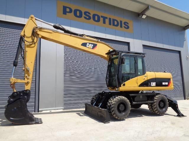 CAT M 318 D Gumikerekes kotrók