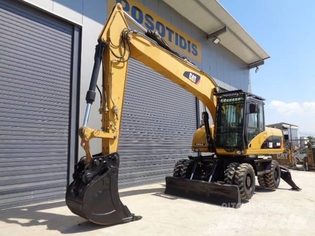CAT M 318 D Gumikerekes kotrók