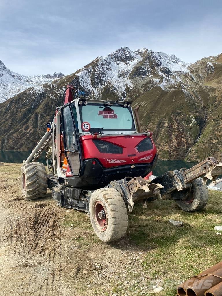 Menzi Muck 325 Gumikerekes kotrók