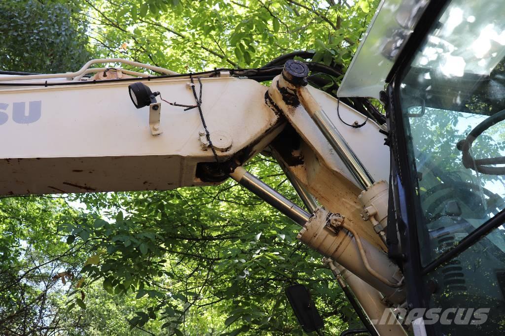 Komatsu PW 140-7 Kotrórakodók